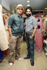 Pravin Dabbas with A D Singh at designer AD Singh store in Mumbai on 22nd Jan 2012.JPG